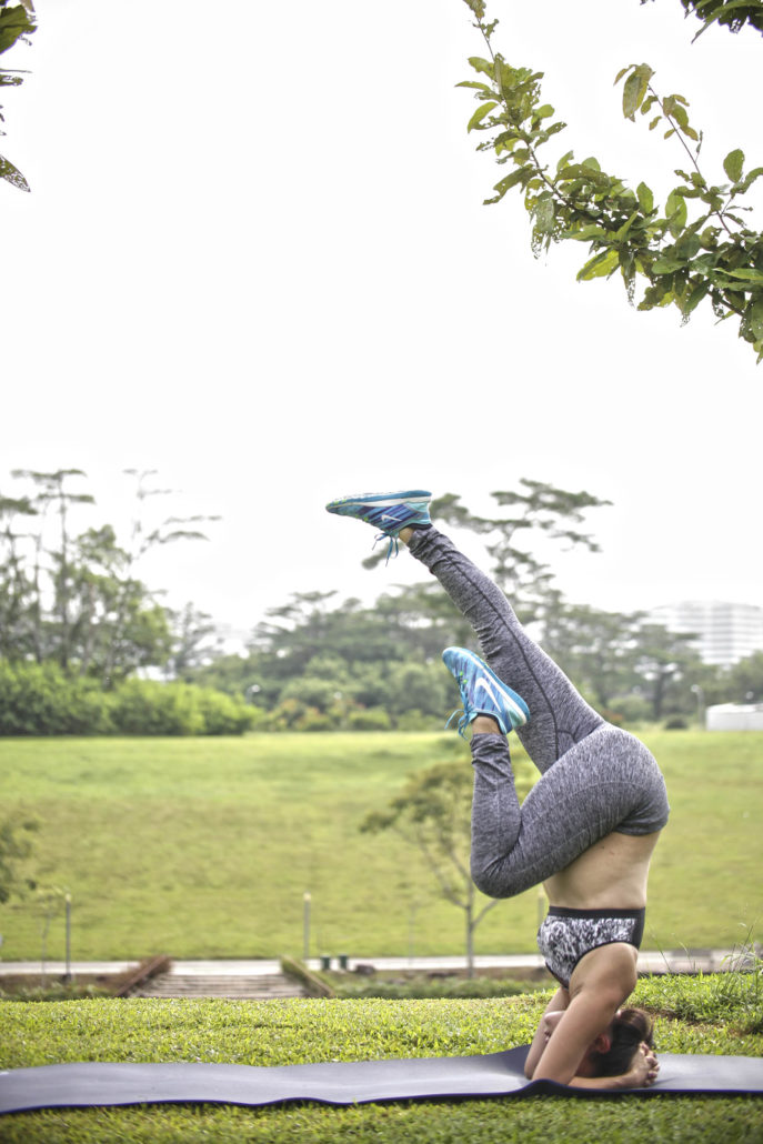 Shuyi pregnant doing yoga singapore